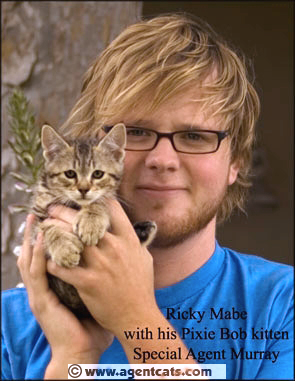 Actor Ricky Mabe and Murray, a Pixie Bob kitten